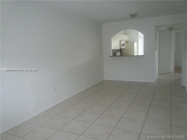 view of tiled spare room