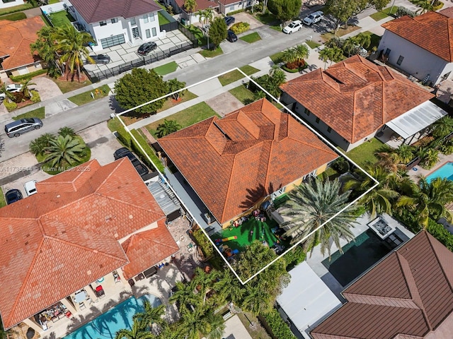 15804 SW 99th Ter, Miami, FL 33196 - aerial perspective of suburban area featuring property parcel outlined and a pool