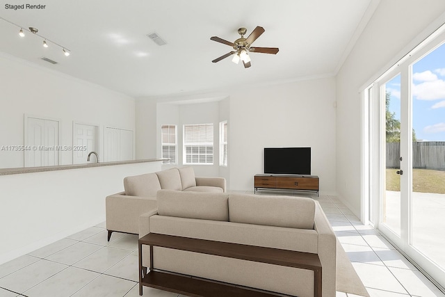 15804 SW 99th Ter, Miami, FL 33196 - living area featuring crown molding, light tile patterned flooring, and a ceiling fan