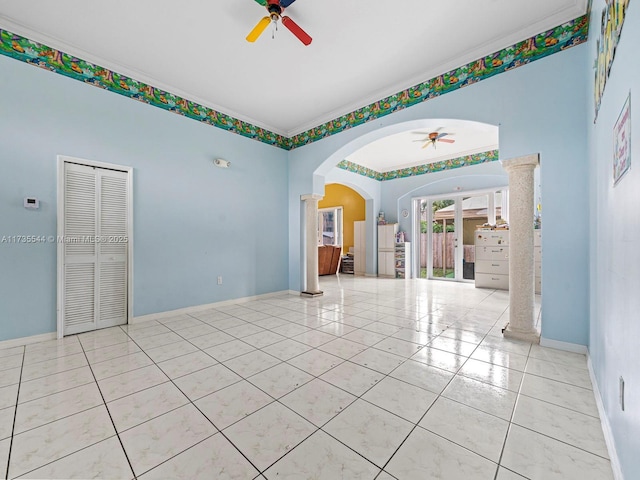 15804 SW 99th Ter, Miami, FL 33196 - tiled empty room featuring a ceiling fan, ornate columns, arched walkways, baseboards, and ornamental molding