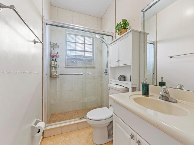 15804 SW 99th Ter, Miami, FL 33196 - bathroom featuring a shower stall, toilet, tile patterned floors, and vanity