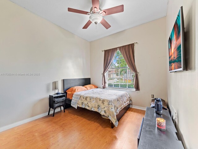 15804 SW 99th Ter, Miami, FL 33196 - bedroom featuring light wood-type flooring and a ceiling fan