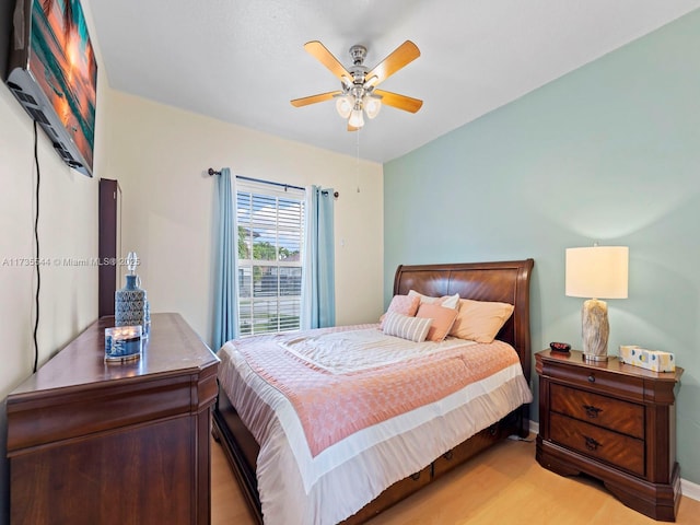 15804 SW 99th Ter, Miami, FL 33196 - bedroom with light wood-style flooring, baseboards, and ceiling fan