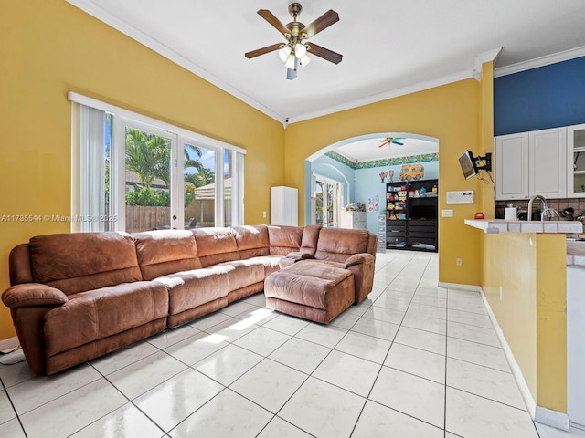 15804 SW 99th Ter, Miami, FL 33196 - living area with a ceiling fan, crown molding, arched walkways, and light tile patterned floors