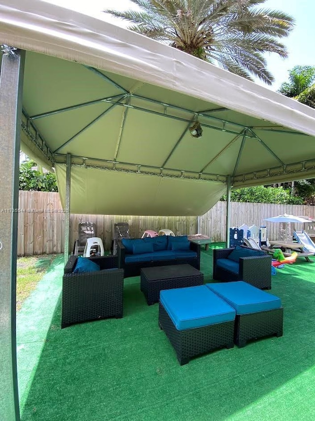 15804 SW 99th Ter, Miami, FL 33196 - view of patio / terrace with a gazebo and an outdoor living space