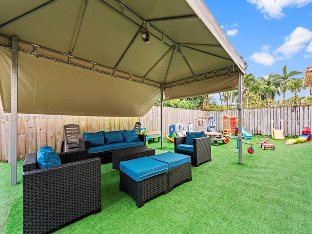 15804 SW 99th Ter, Miami, FL 33196 - view of patio featuring an outdoor living space and a playground