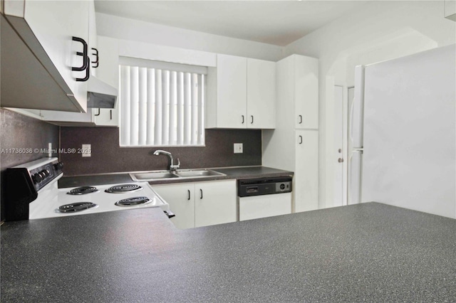 7011 W 29th Ave Unit 210, Hialeah, FL 33018 - kitchen featuring white appliances, dark countertops, white cabinetry, decorative backsplash, and extractor fan