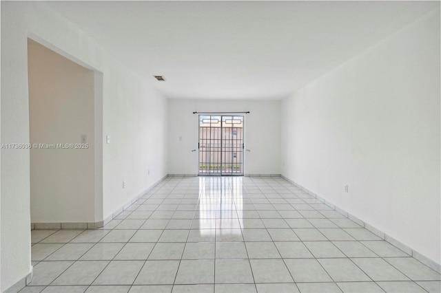 7011 W 29th Ave Unit 210, Hialeah, FL 33018 - unfurnished room with light tile patterned flooring