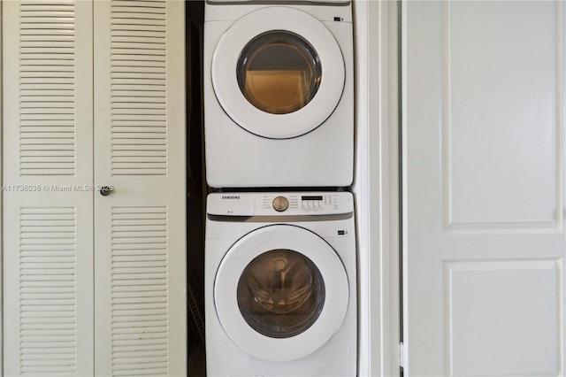 7011 W 29th Ave Unit 210, Hialeah, FL 33018 - laundry room with stacked washer / dryer