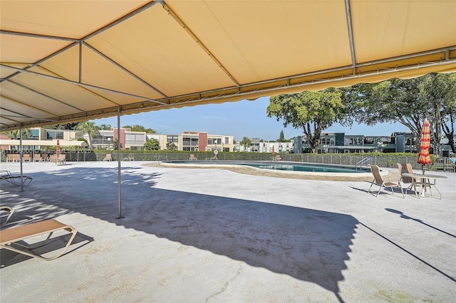 view of pool featuring a patio area