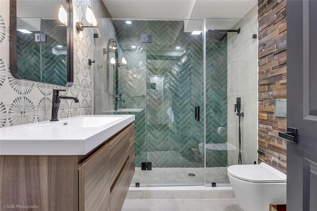 bathroom featuring walk in shower, vanity, and toilet