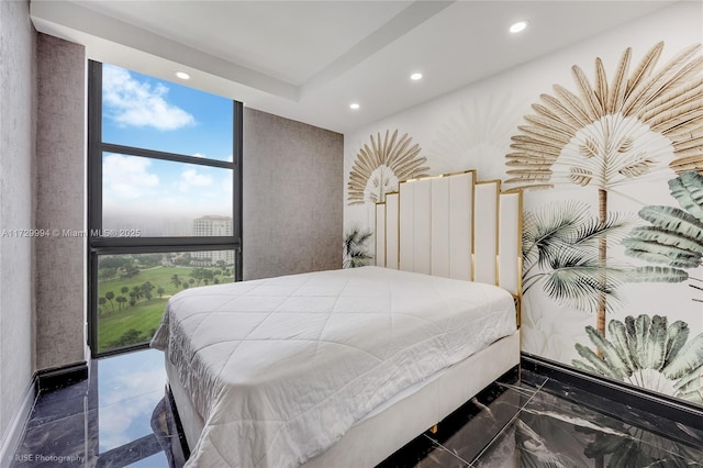 bedroom with floor to ceiling windows