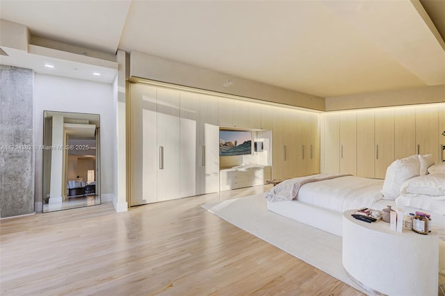 bedroom with light wood-type flooring