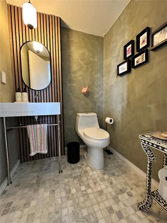 bathroom featuring toilet