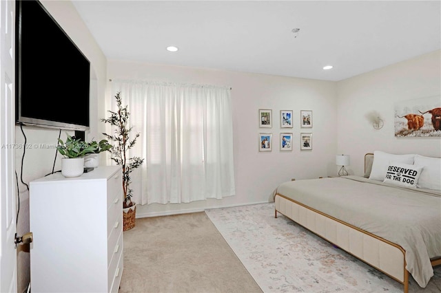 bedroom featuring recessed lighting and light colored carpet