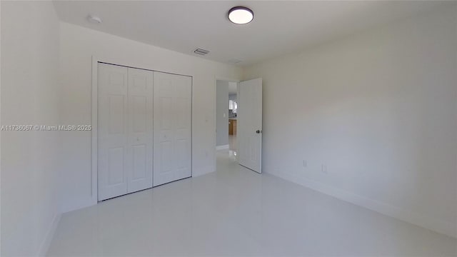 unfurnished bedroom featuring a closet