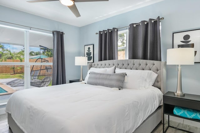 bedroom featuring ceiling fan, access to outside, and light wood-type flooring