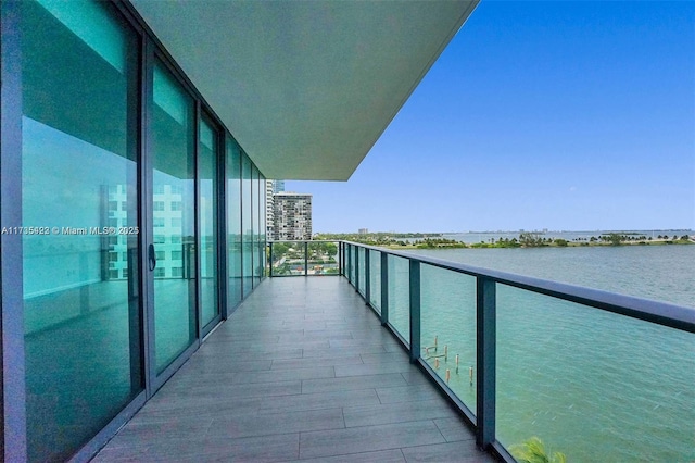 balcony featuring a water view