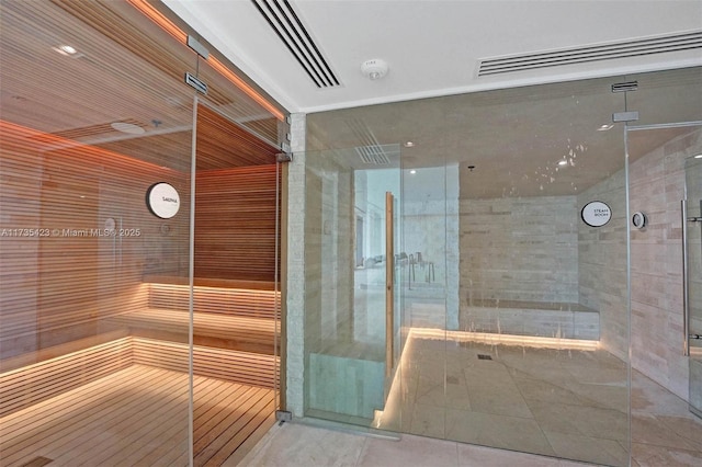 view of sauna featuring tile patterned floors