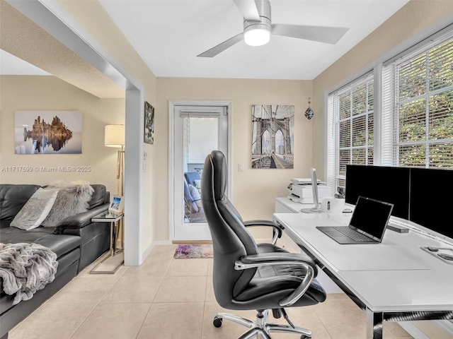 tiled office space with ceiling fan