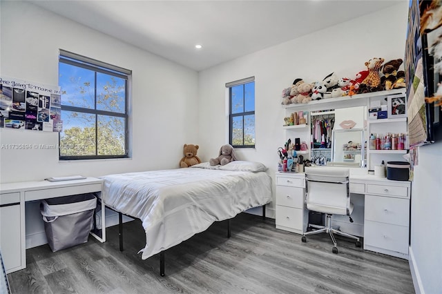 bedroom featuring hardwood / wood-style flooring