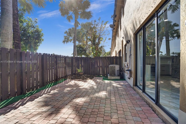 view of patio with central AC unit