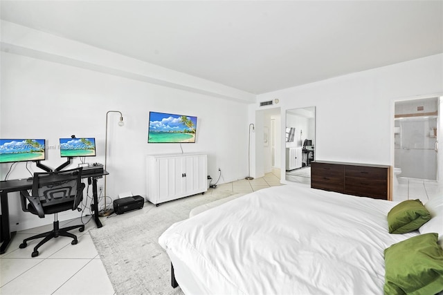 bedroom with light tile patterned floors