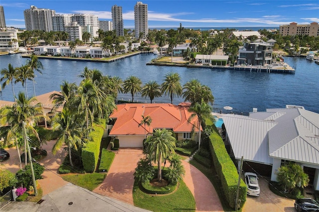 bird's eye view with a water view and a city view