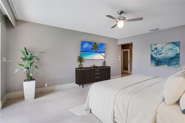 bedroom featuring baseboards, visible vents, and a ceiling fan