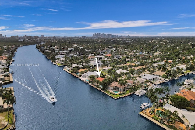 birds eye view of property featuring a water view