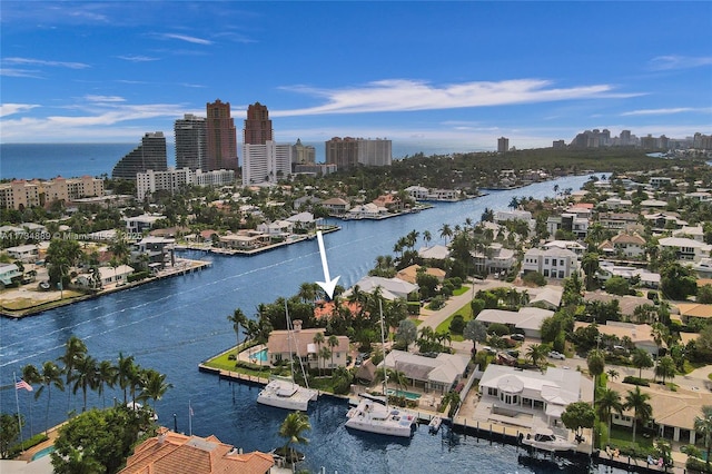 drone / aerial view with a water view and a city view