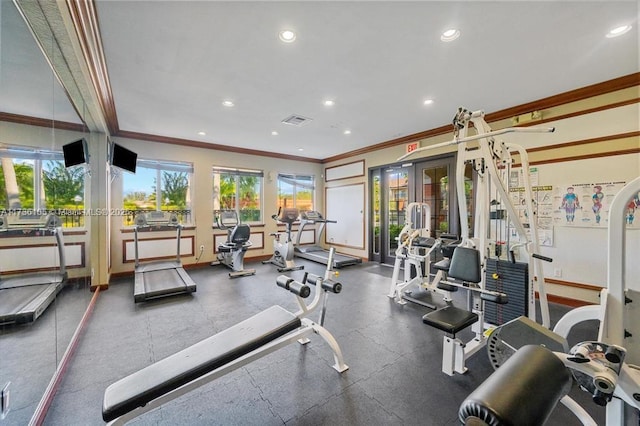 exercise room featuring ornamental molding and french doors