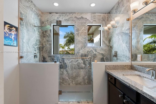 bathroom featuring vanity and walk in shower