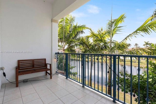 balcony featuring a water view