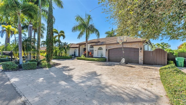 view of front of property with a garage