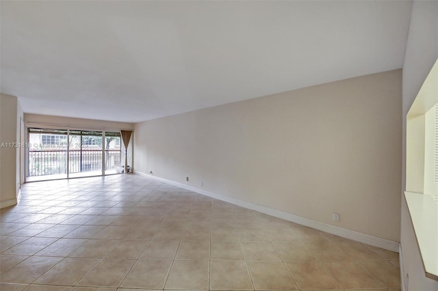 empty room featuring light tile patterned flooring