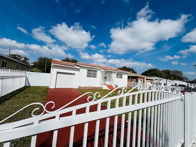 view of front of property featuring a garage