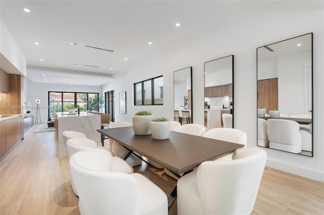 dining area with light hardwood / wood-style flooring