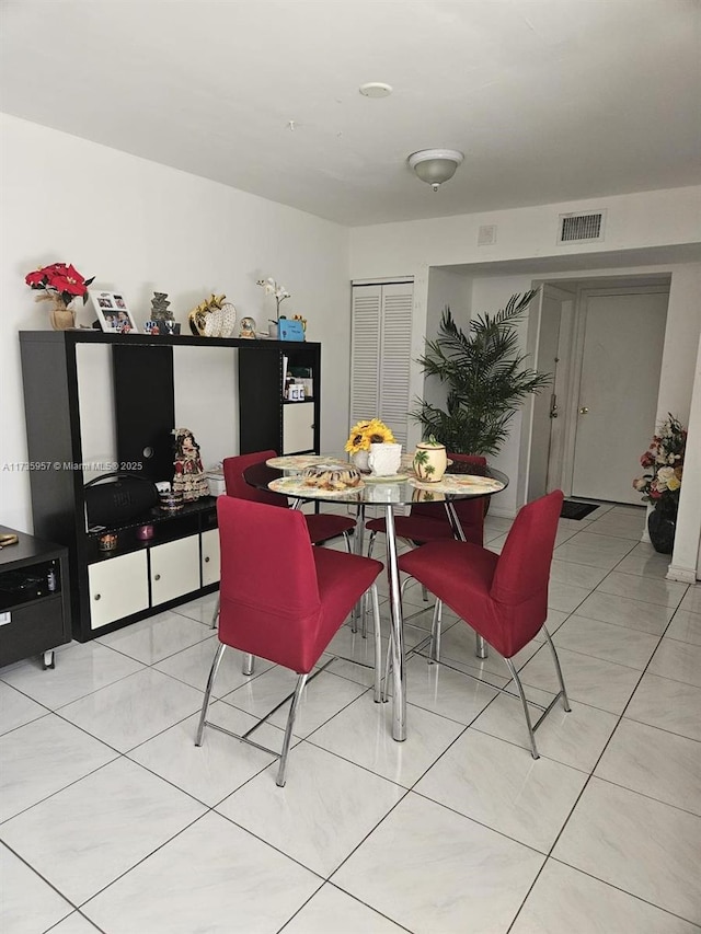 view of tiled dining area