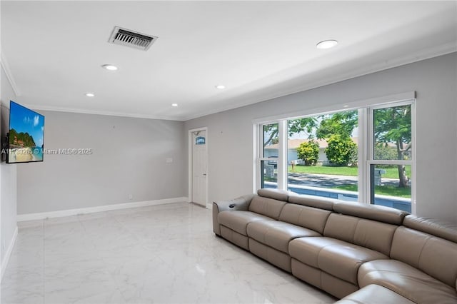 living room featuring crown molding