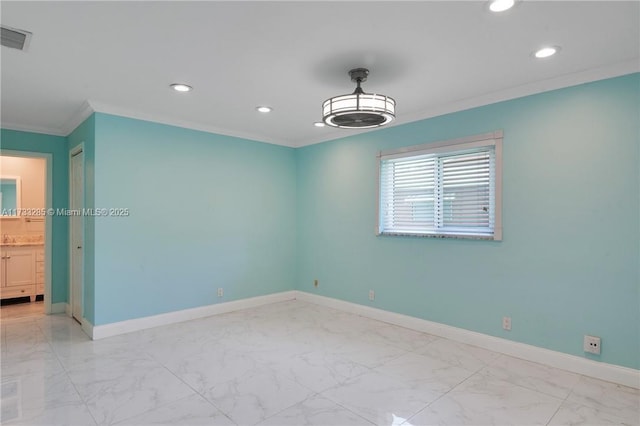 unfurnished room featuring ornamental molding