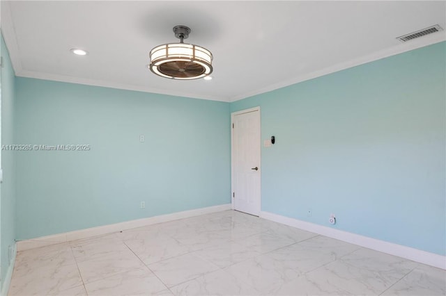 spare room with ornamental molding