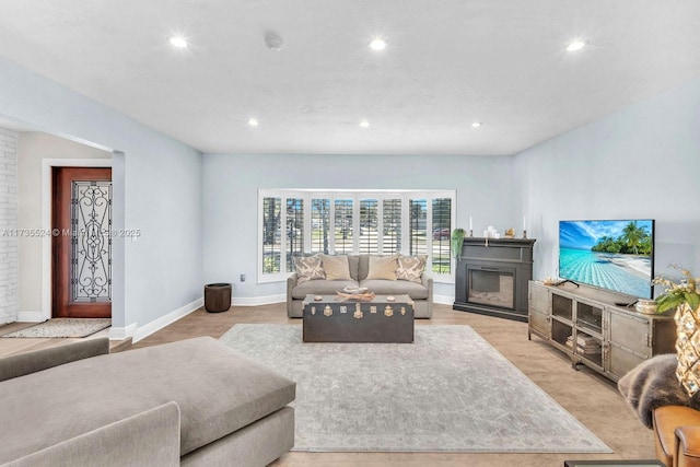 living room with light hardwood / wood-style floors