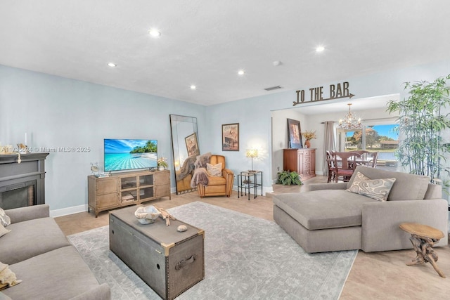 living room featuring a notable chandelier