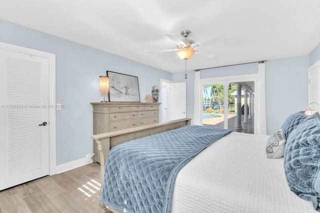 bedroom featuring access to exterior, ceiling fan, and light hardwood / wood-style flooring