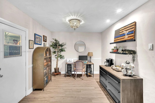 office space with light hardwood / wood-style flooring