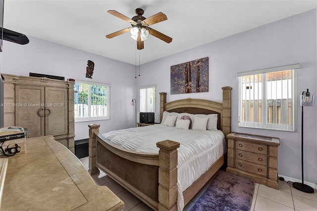 bedroom featuring tile patterned floors and ceiling fan