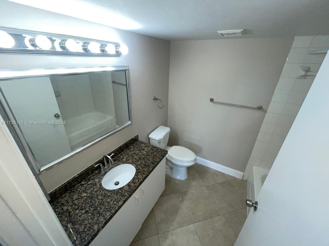 bathroom with tile patterned floors, visible vents, toilet, baseboards, and vanity