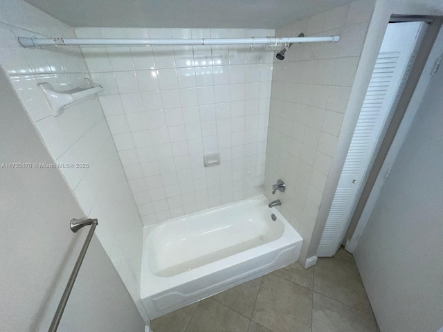 full bathroom featuring tile patterned flooring and  shower combination
