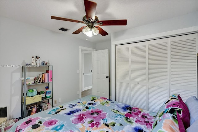 bedroom featuring a closet and ceiling fan